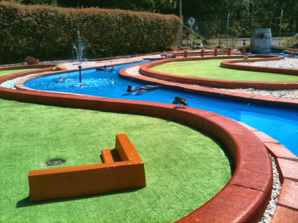 Crazy Putt mini golf hole with water hazard